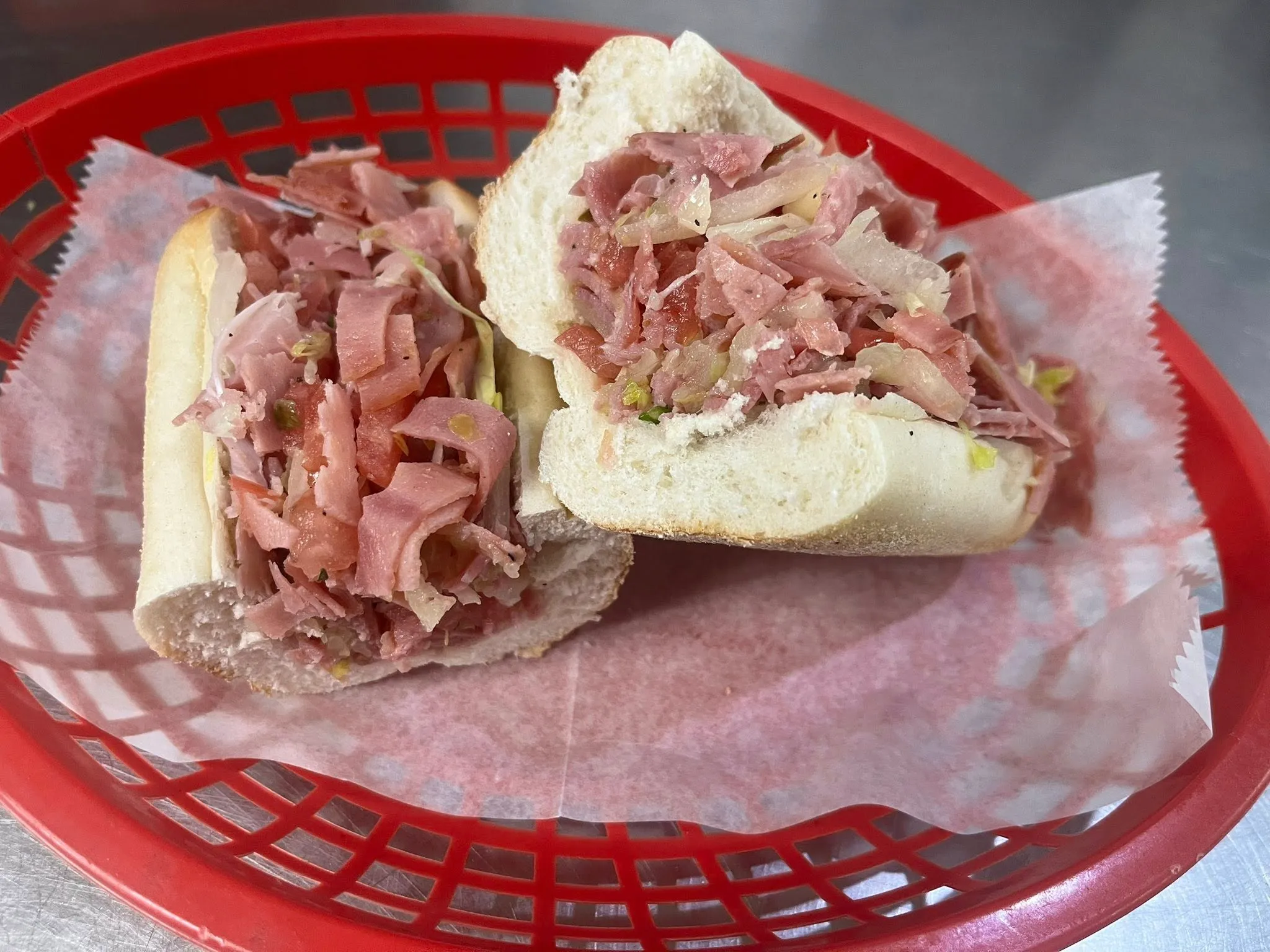 A Chopped Italian Hoagie with finely chopped meats, cheese, and toppings blended together on a fresh-baked roll